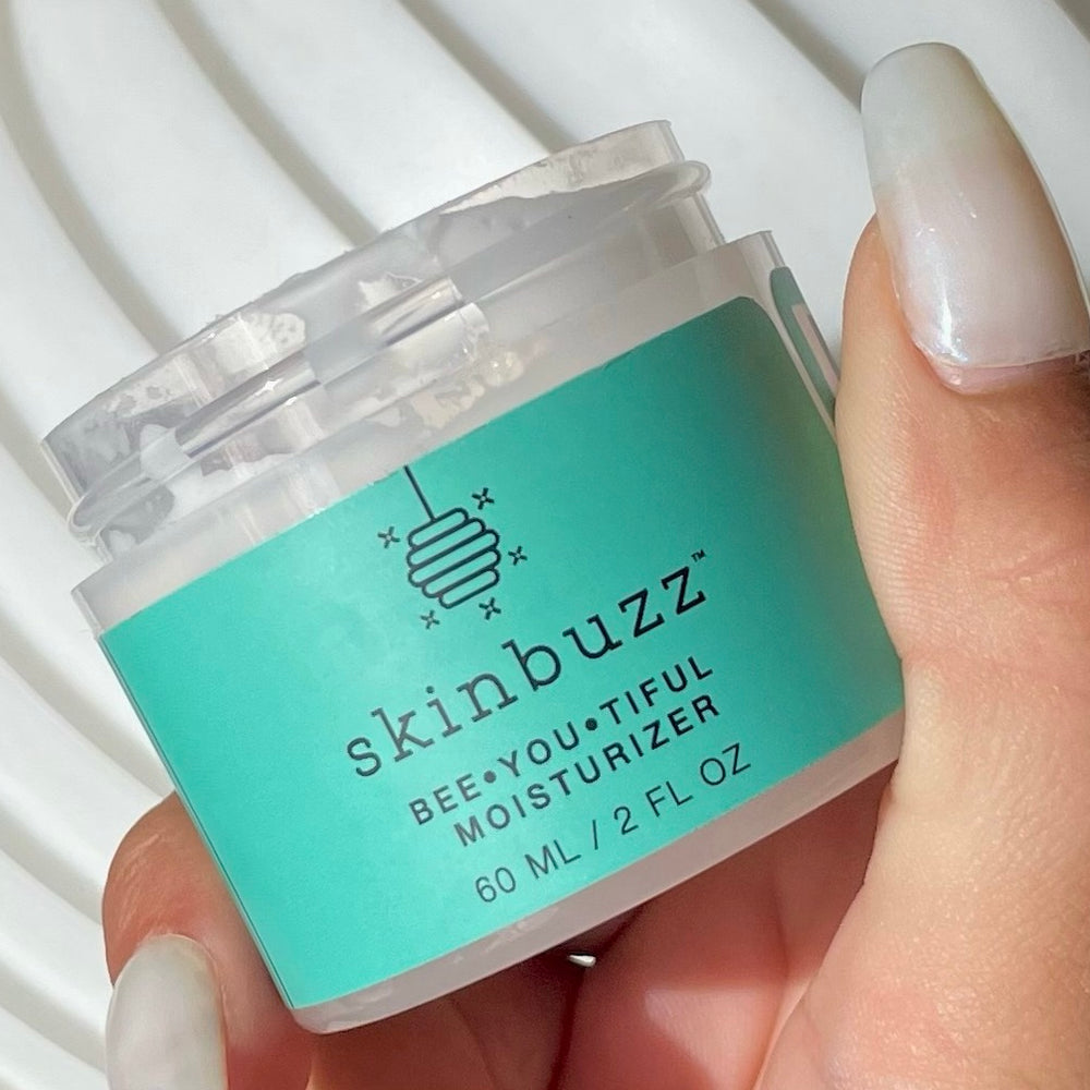 Skinbuzz Bee•You•Tiful Moisturizer, an organic skincare product with beeswax, perfect for summer hydration.