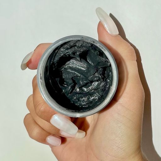 
                  
                    skinbuzz charcoal face mask product jar open
                  
                